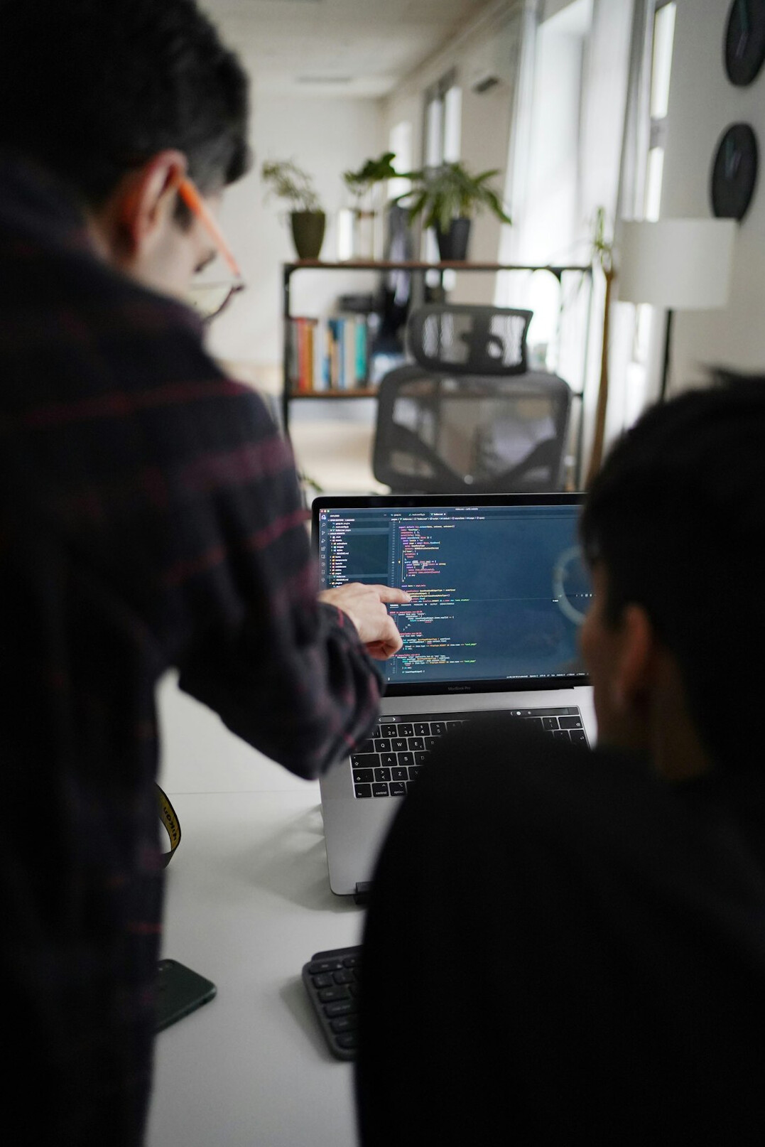 programmer coding at desk