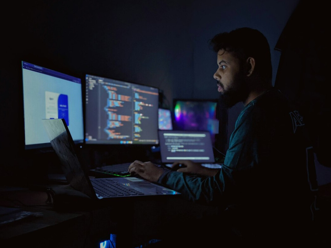programmer writing insurance code